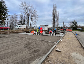 Úprava terénu, realizace zpevněných ploch, vnější kanalizace, vodovodu a oplocení - parkoviště spol. ADKO.